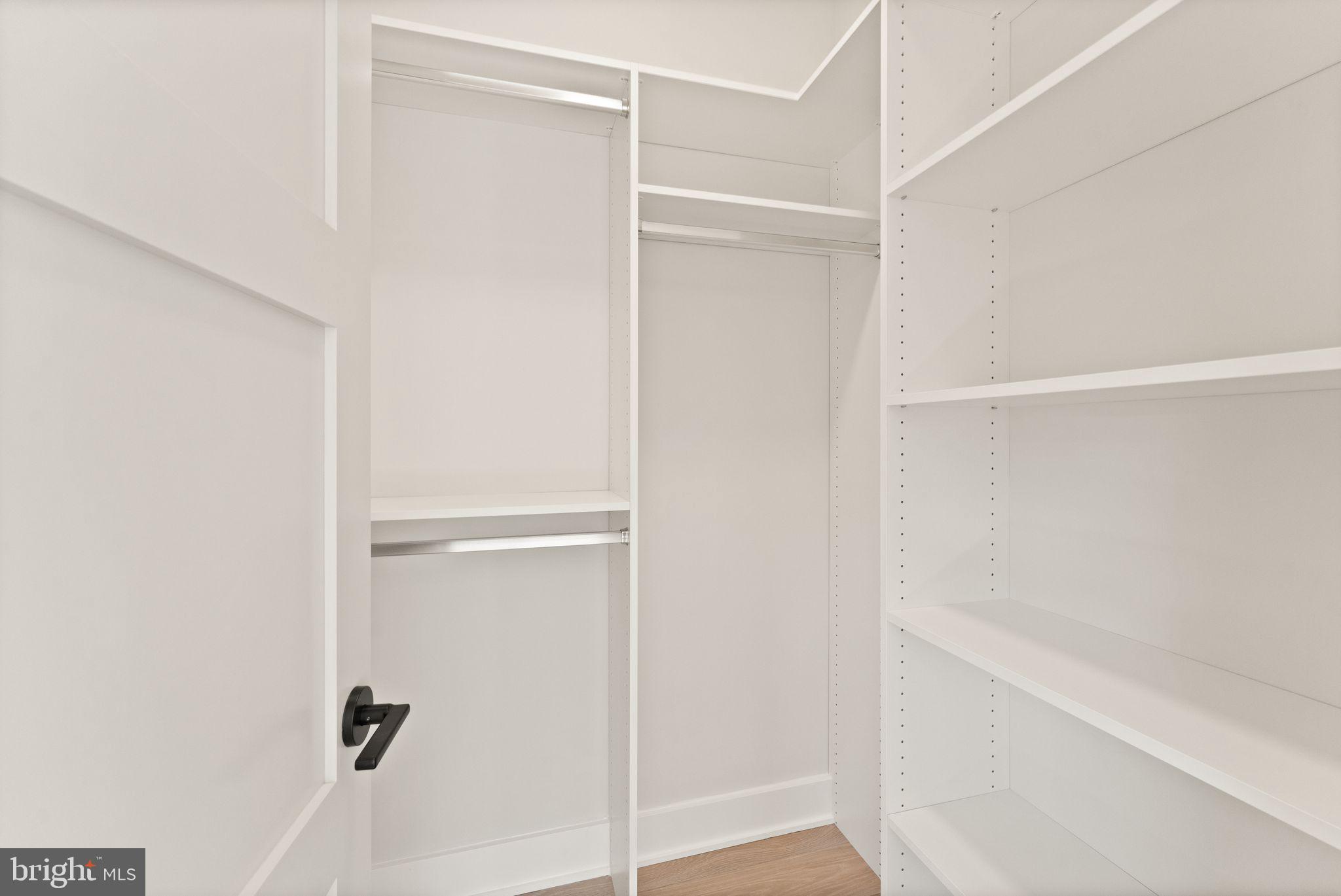 917 Timber Lane Southwest Vienna, VA 22180 - Photo 36 of 41 a view of walk in closet with empty racks
