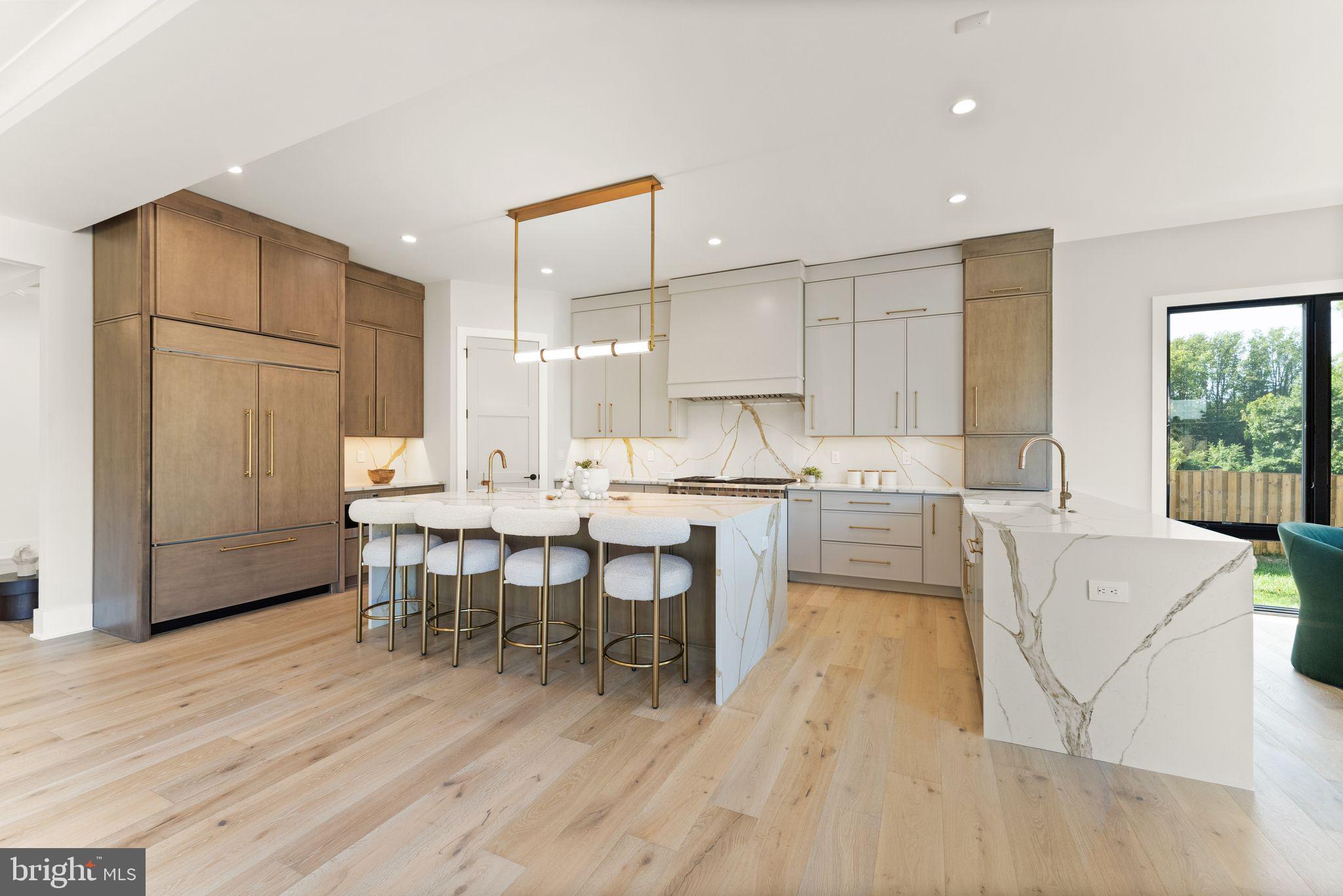 917 Timber Lane Southwest Vienna, VA 22180 - Photo 6 of 41 a living room with stainless steel appliances kitchen island granite countertop furniture and wooden floor