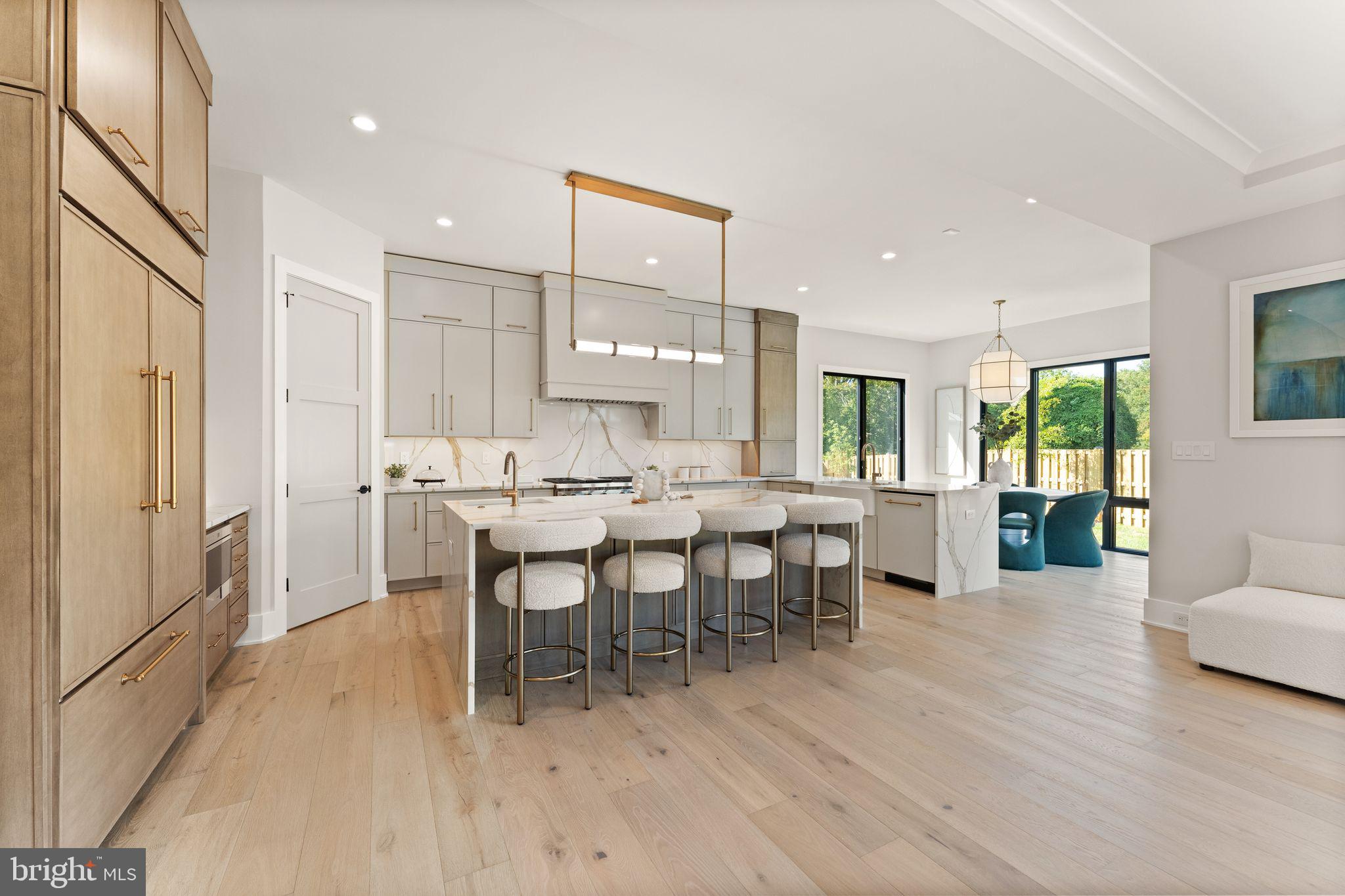 917 Timber Lane Southwest Vienna, VA 22180 - Photo 7 of 41 a large kitchen with a table and chairs