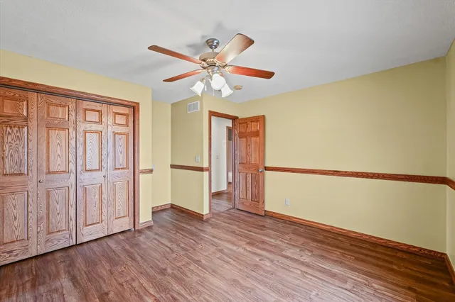a bathroom with a sink a mirror and a shower