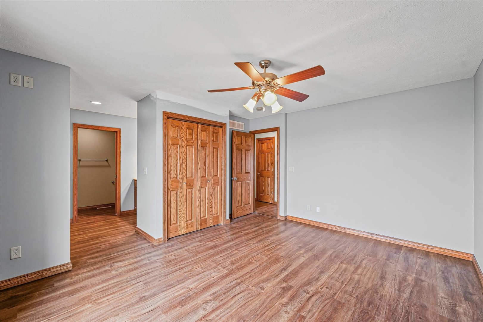8735 North 2000 E Road Fairbury, IL 61739 - Photo 21 of 64 an empty room with wooden floor and windows