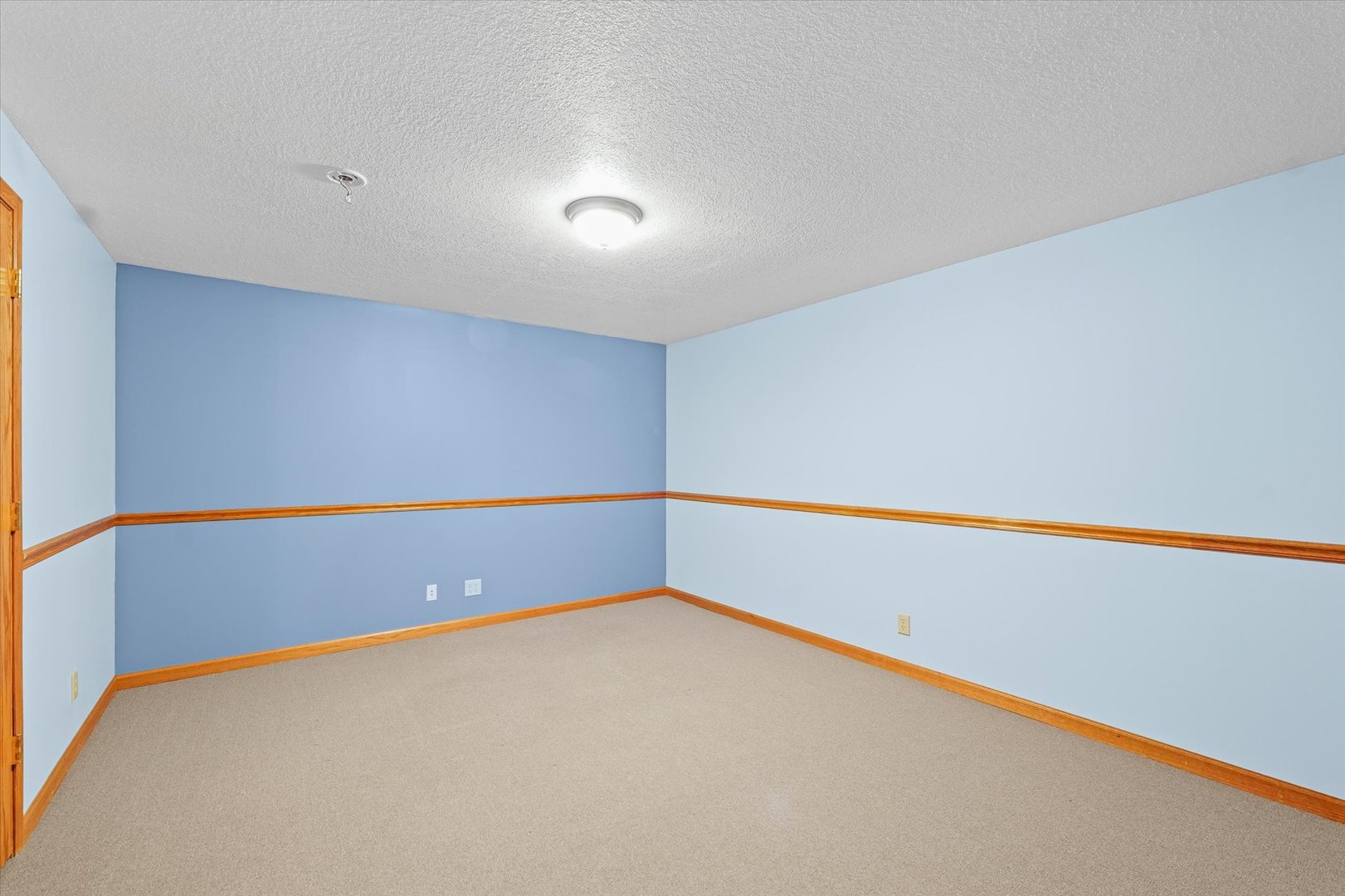 8735 North 2000 E Road Fairbury, IL 61739 - Photo 31 of 64 a room with an empty space and wooden floor