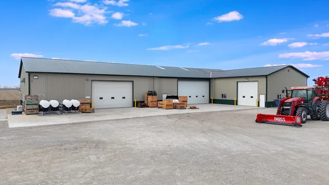 a view of a field with an ocean