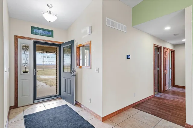 a open kitchen with a sink stove and a refrigerator
