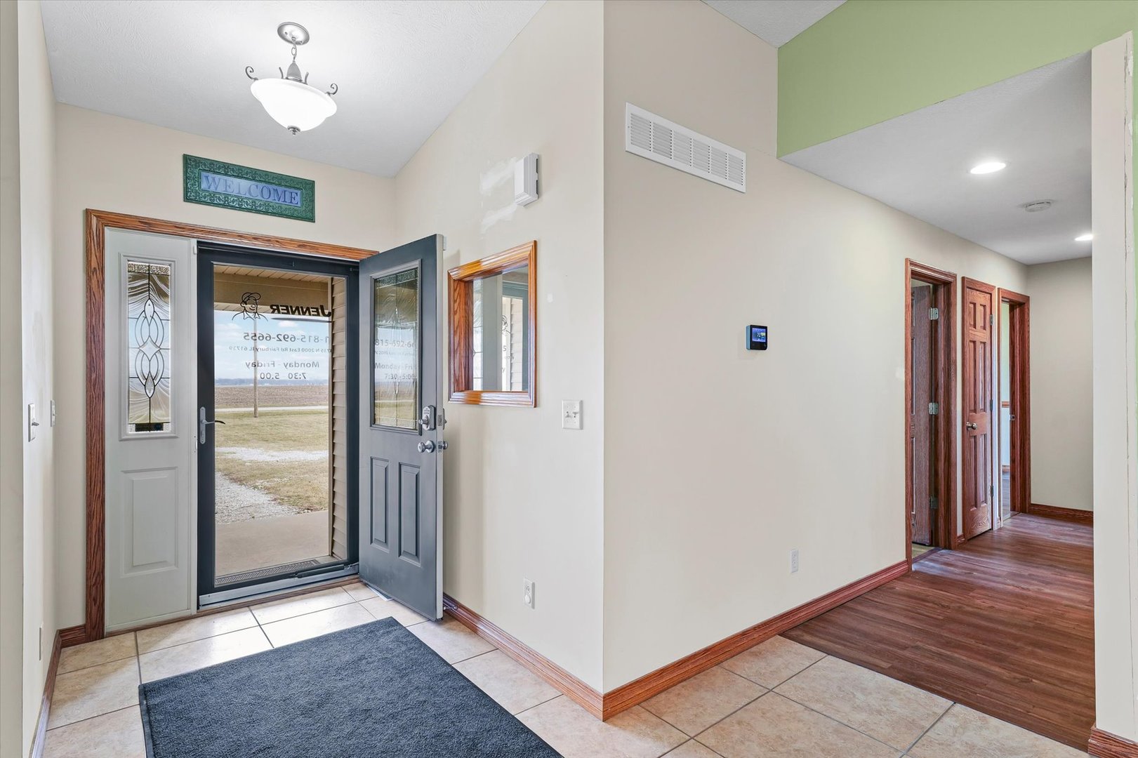8735 North 2000 E Road Fairbury, IL 61739 - Photo 10 of 64 a view of a hallway with wooden floor and closet
