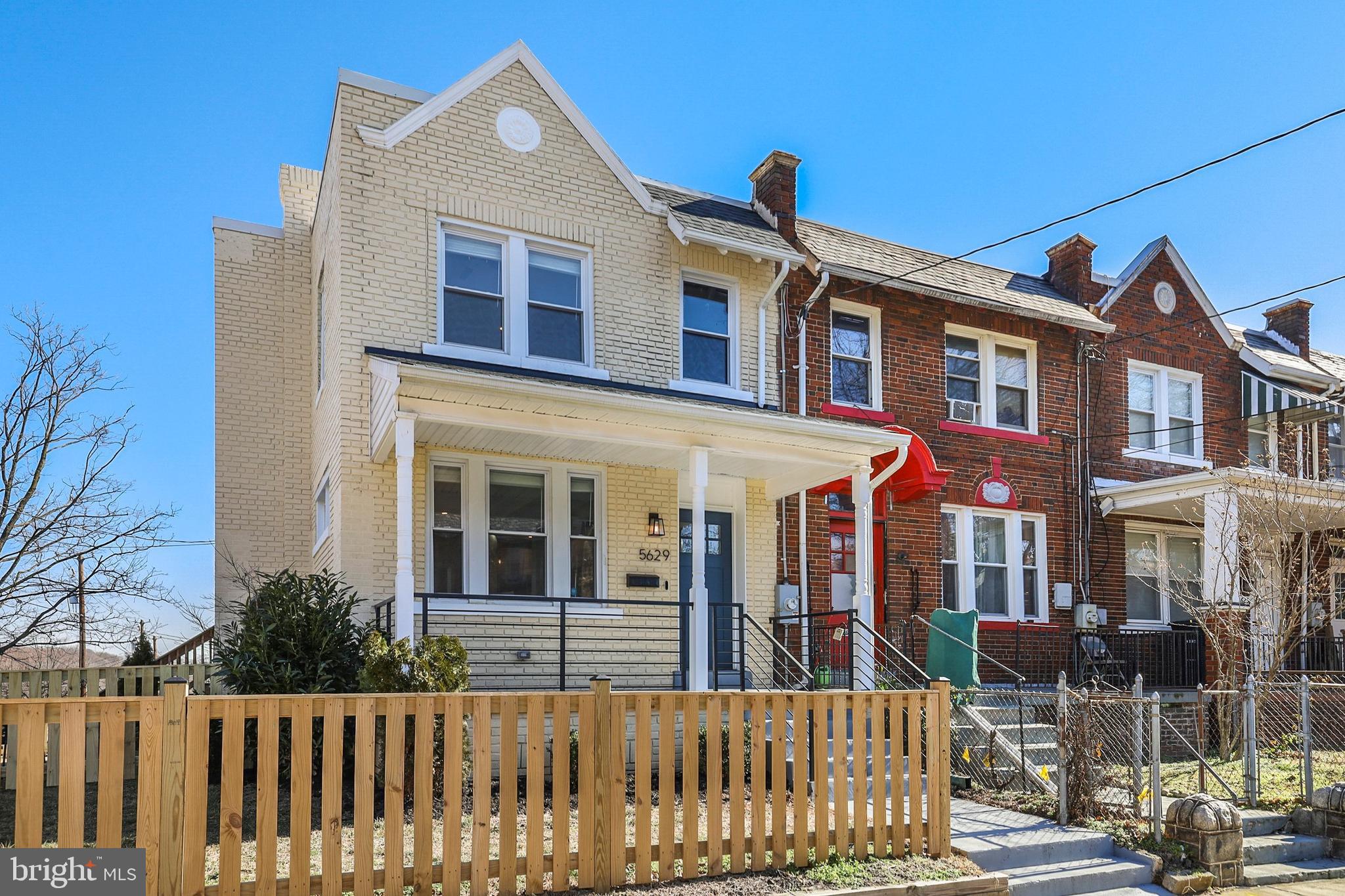 5629 8th Street Northwest Washington, DC 20011 - Photo 1 of 42 a front view of a house with glass windows