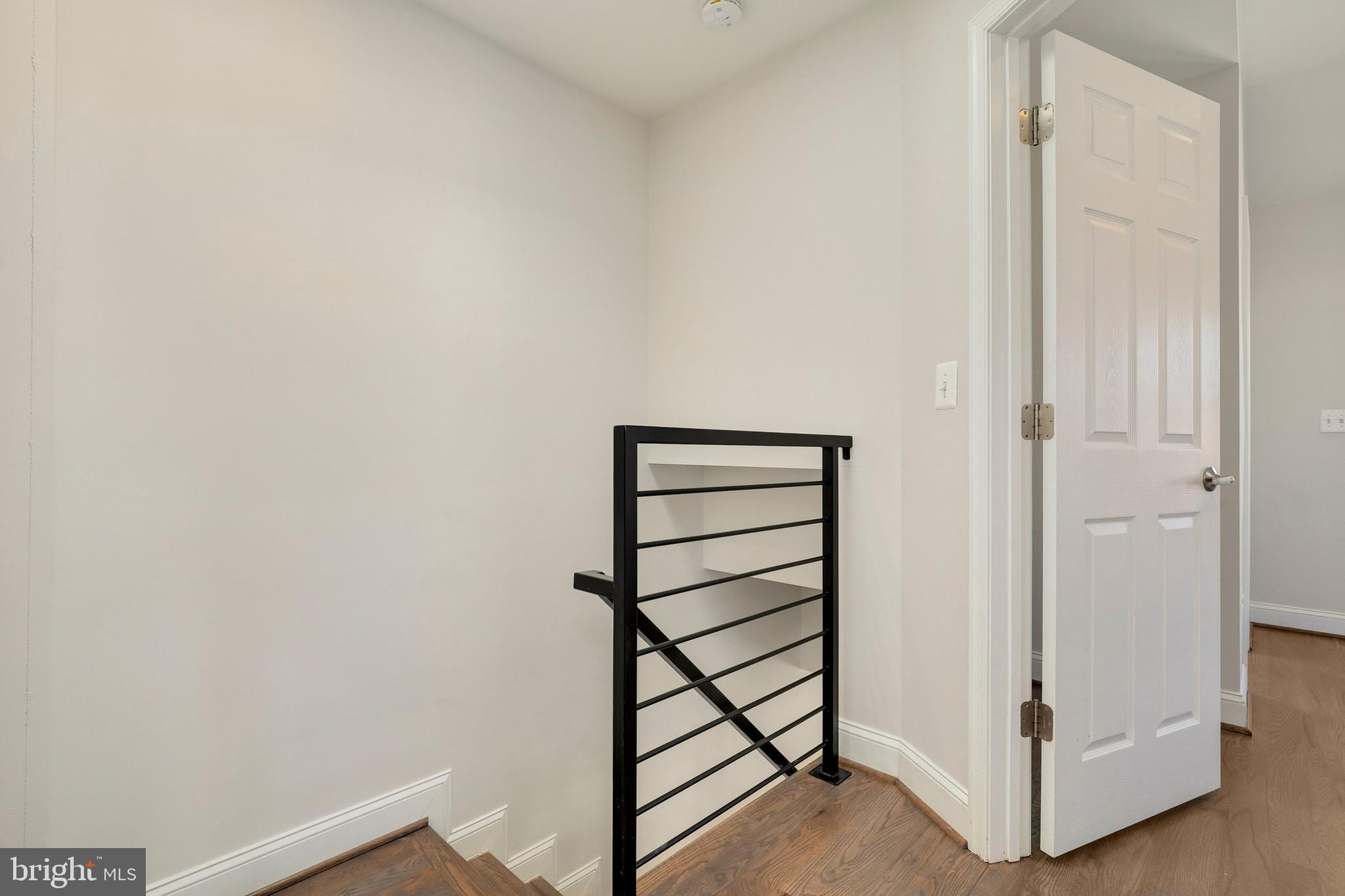 5629 8th Street Northwest Washington, DC 20011 - Photo 17 of 42 a view of a hallway with staircase