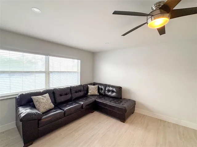 a bathroom with a sink and a large mirror