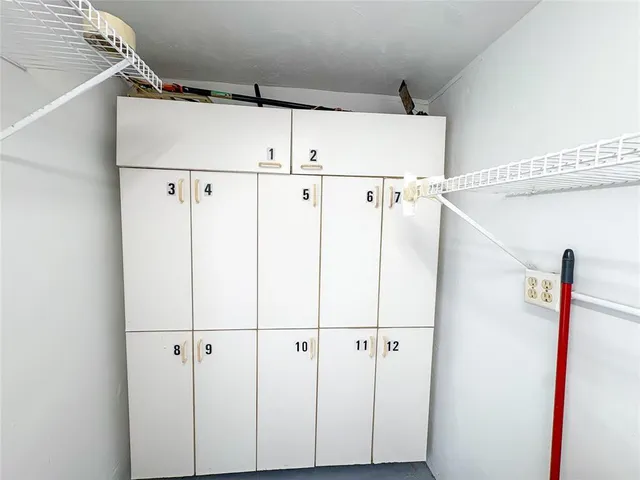 a view of a chair and table in the kitchen
