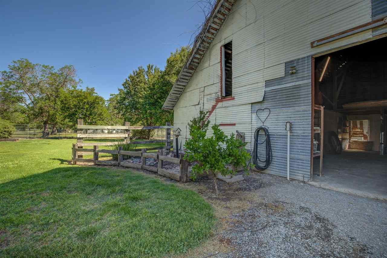 6110 Napa Road Corning, CA 96021 - Photo 45 of 62 a view of a chair and table in backyard of the house