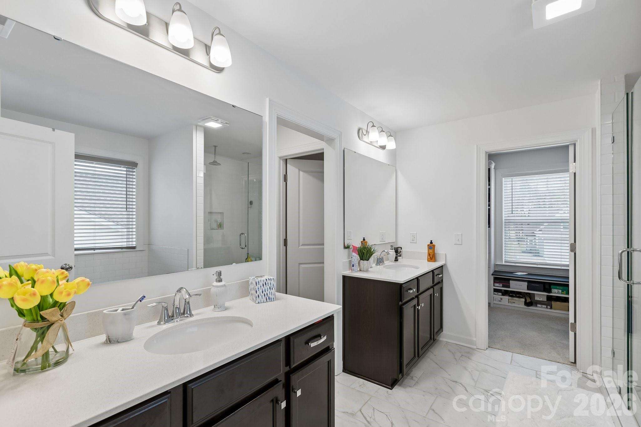 911 Cypress Point Lane Monroe, NC 28112 - Photo 20 of 37 a bathroom with a sink double vanity