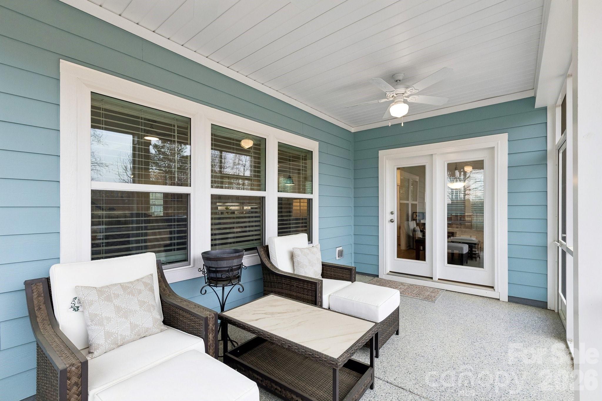 911 Cypress Point Lane Monroe, NC 28112 - Photo 33 of 37 a outdoor living space with furniture and a potted plant
