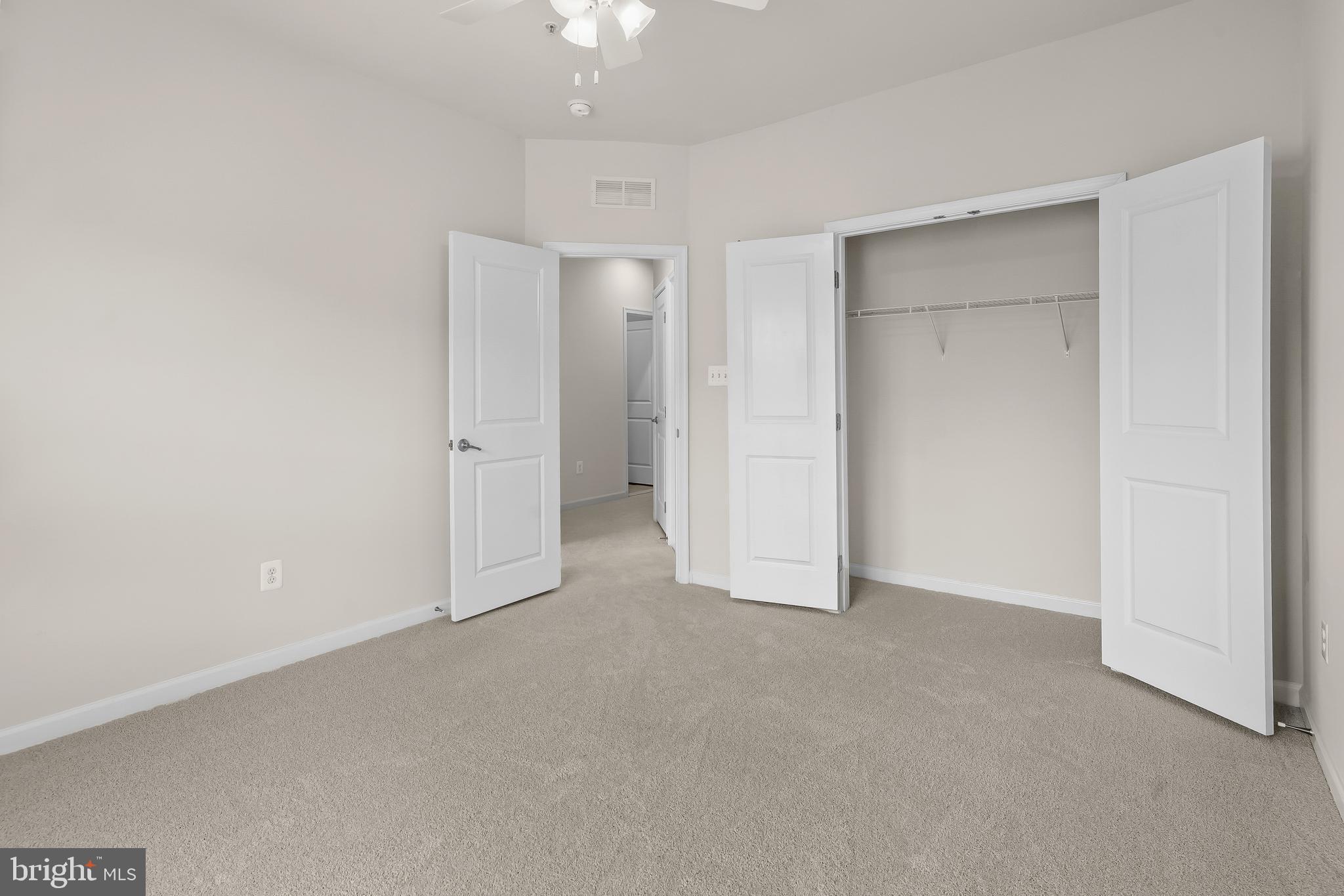 336 Chessington Drive Odenton, MD 21113 - Photo 18 of 24 an empty room with chandelier fan