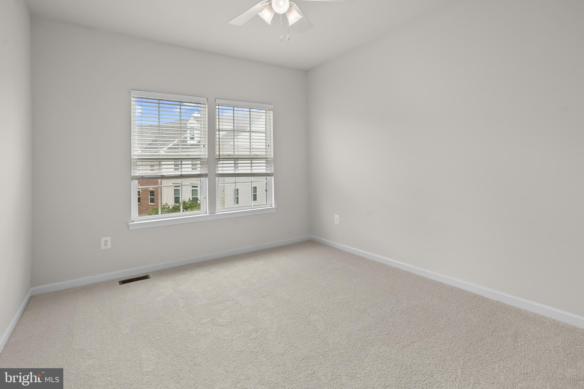 336 Chessington Drive Odenton, MD 21113 - Photo 19 of 24 an empty room with windows and closet