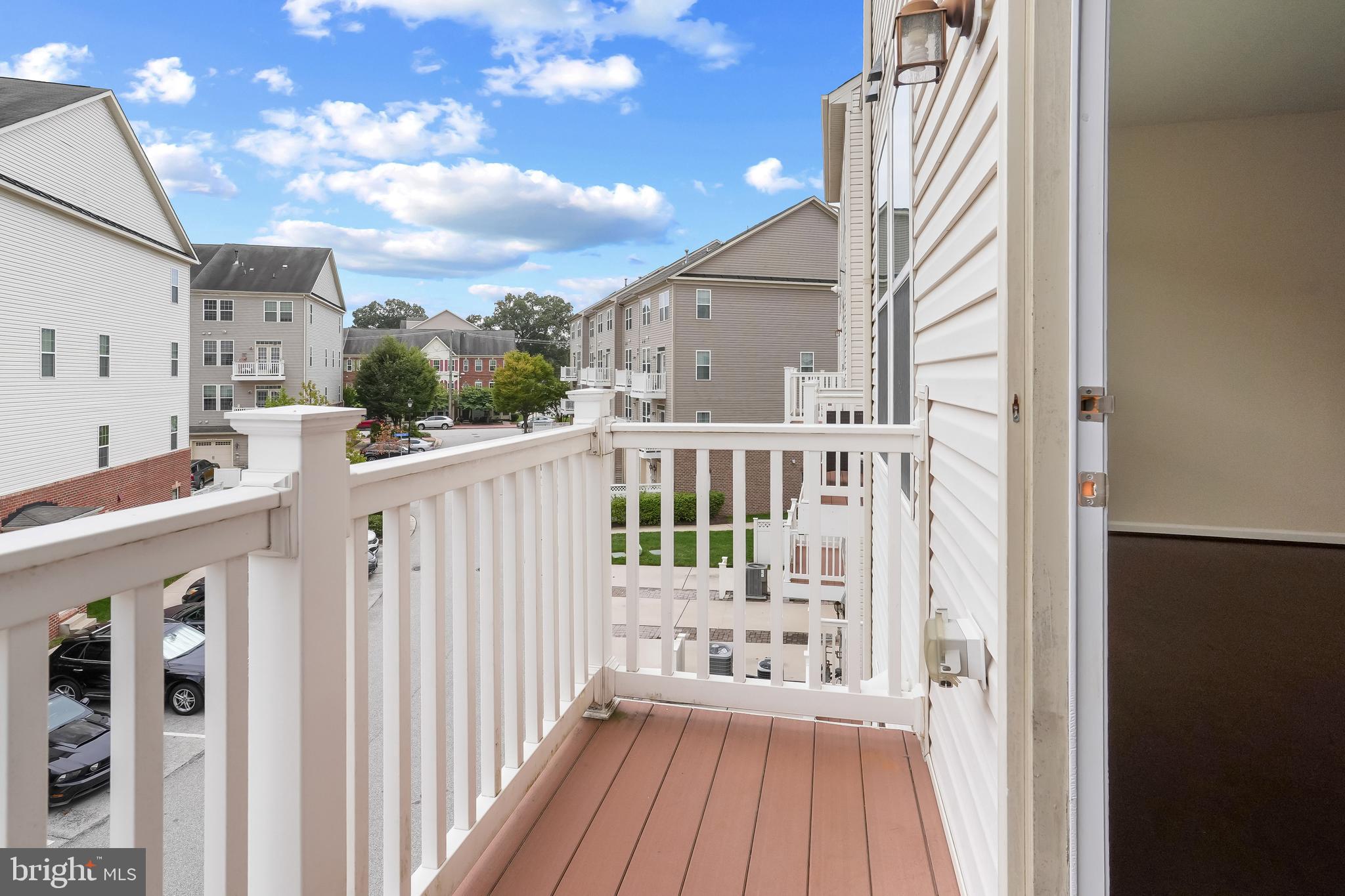 336 Chessington Drive Odenton, MD 21113 - Photo 23 of 24 a view of a house with wooden deck
