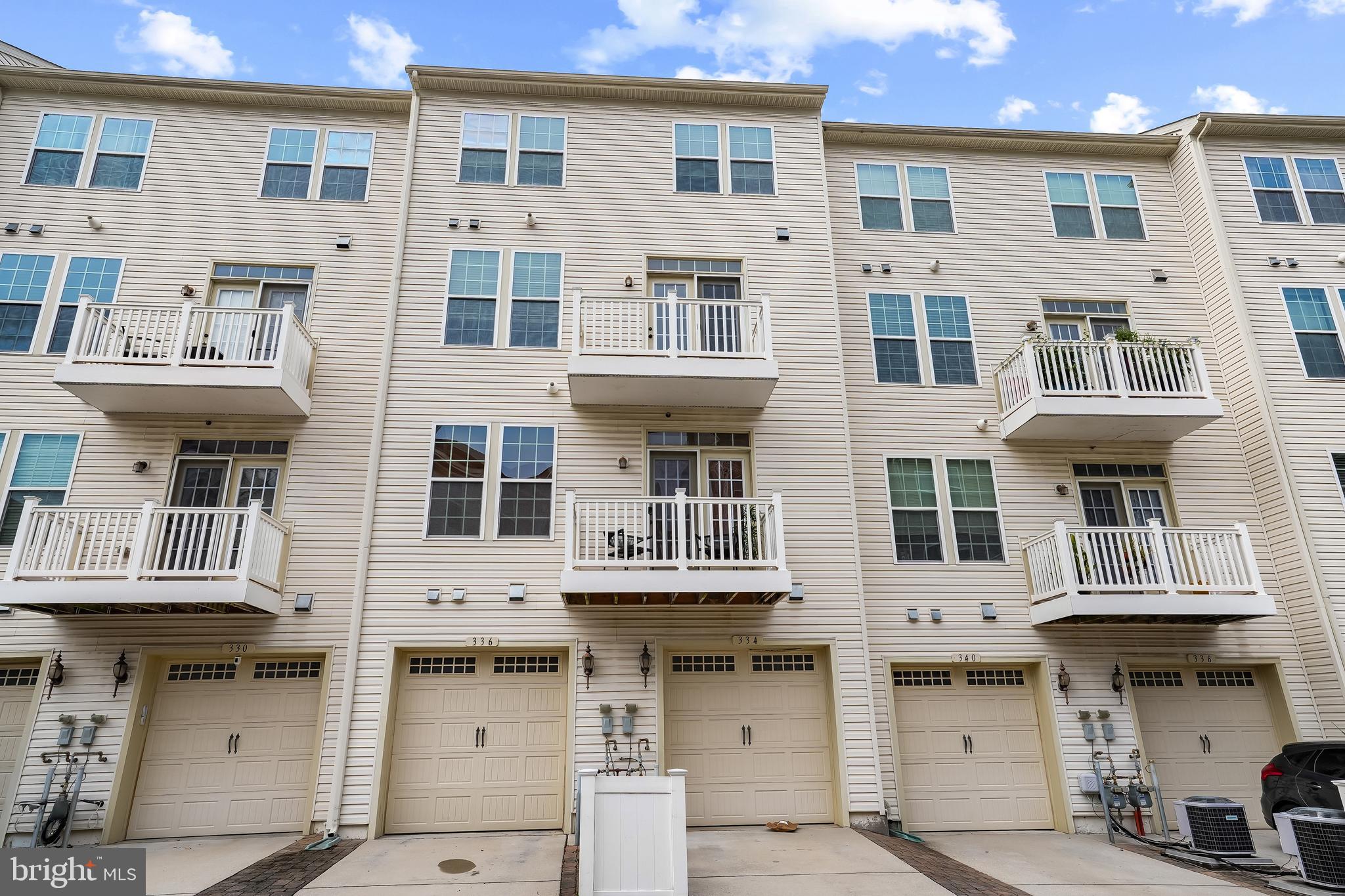 336 Chessington Drive Odenton, MD 21113 - Photo 24 of 24 a front view of building with a lot of windows