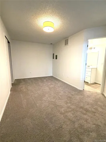 an empty room with a natural light