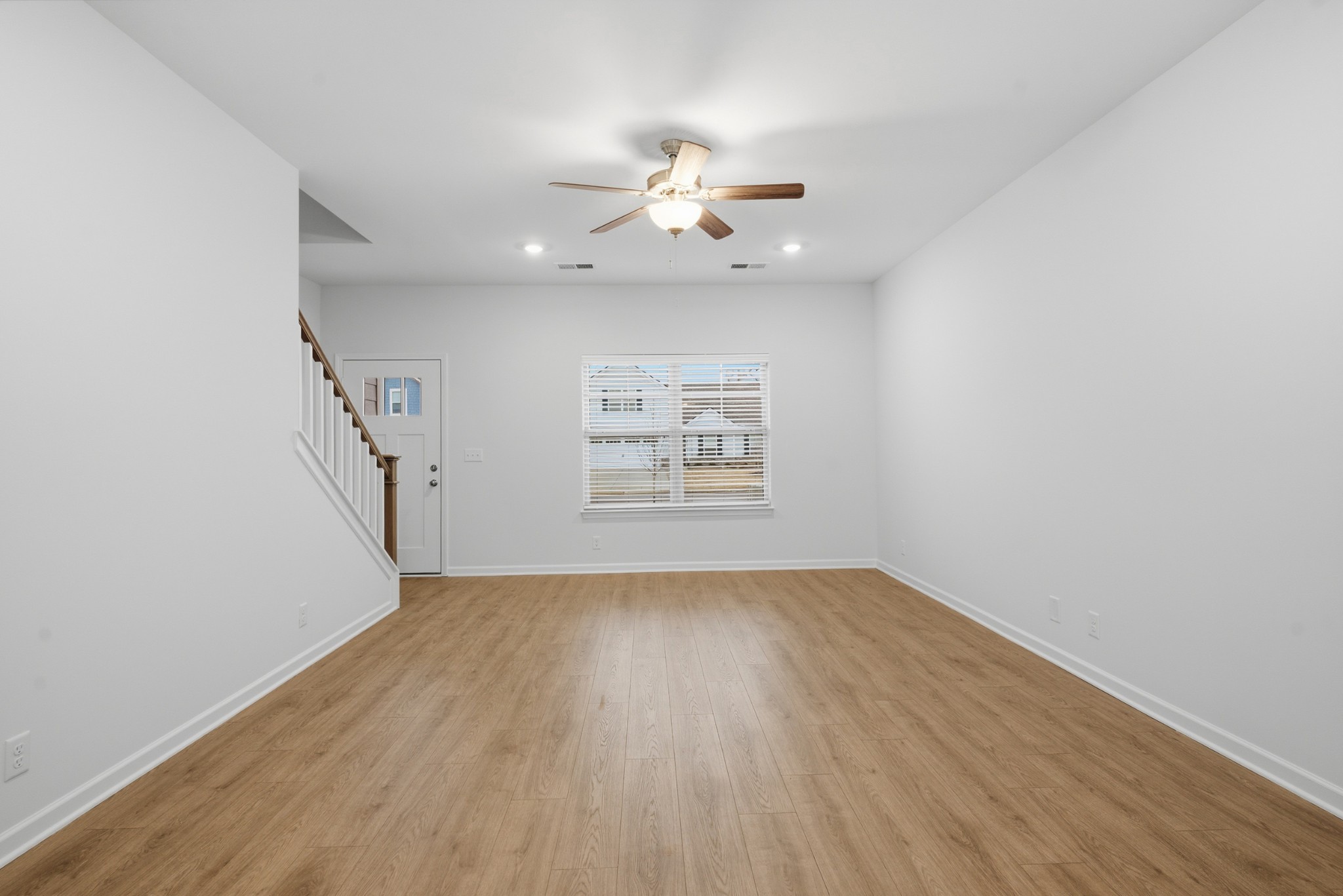 4015 Colleton Lane Murfreesboro, TN 37153 - Photo 5 of 34 wooden floor in an empty room with a window