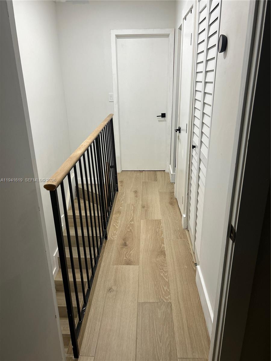 15103 Southwest 81st Street, Unit 213 Miami, FL 33193 - Photo 8 of 13 a view of a hallway