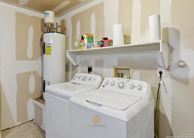 a utility room with dryer and washer