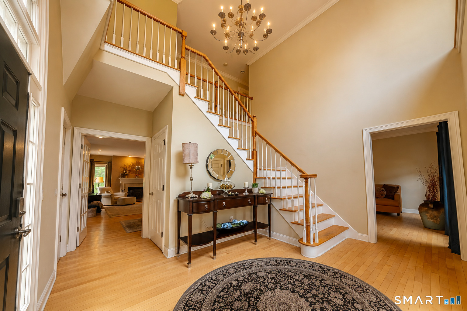 4 Ortense Road Wallingford, CT 06492 - Photo 8 of 33 a view of a hallway with wooden floor and staircase