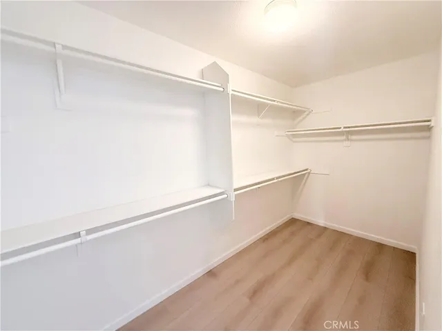a view of an empty walk in closet