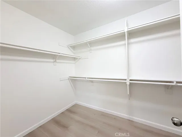 a view of an empty walk in closet