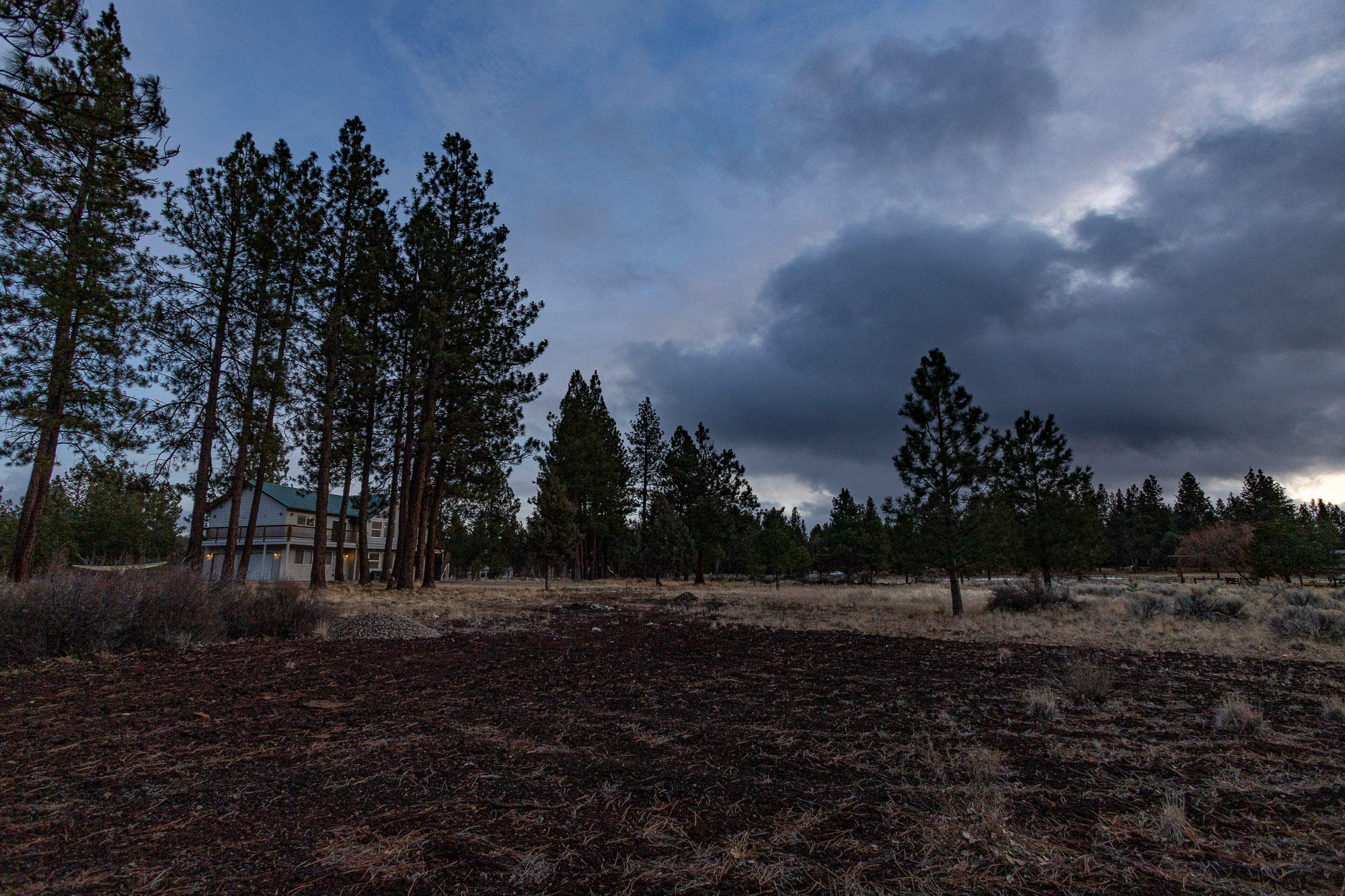 19490 Calico Road Bend, OR 97702 - Photo 64 of 67 a view of outdoor space with green field