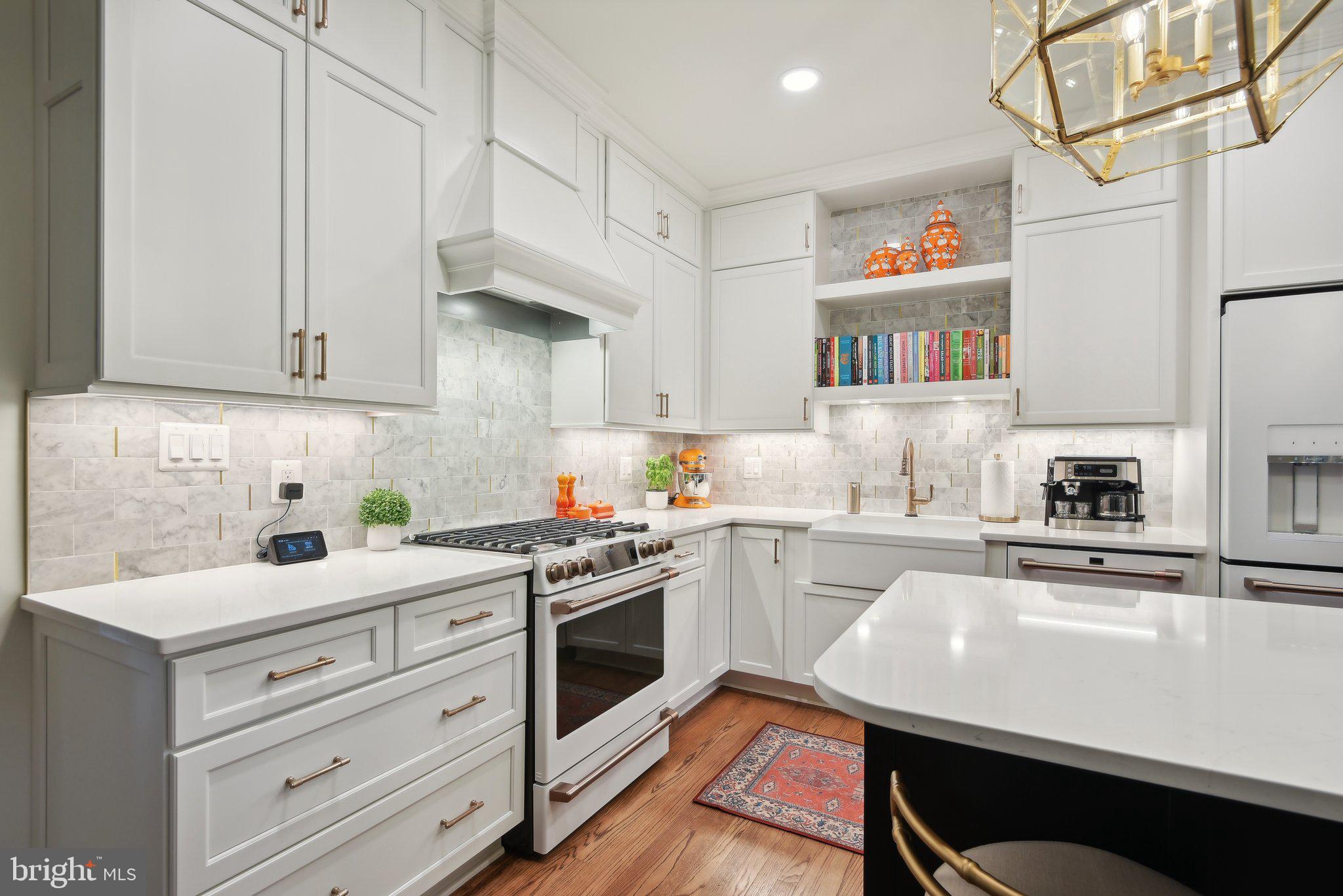 1331 Sundial Drive Reston, VA 20194 - Photo 11 of 38 White cabinets with gold hardware!