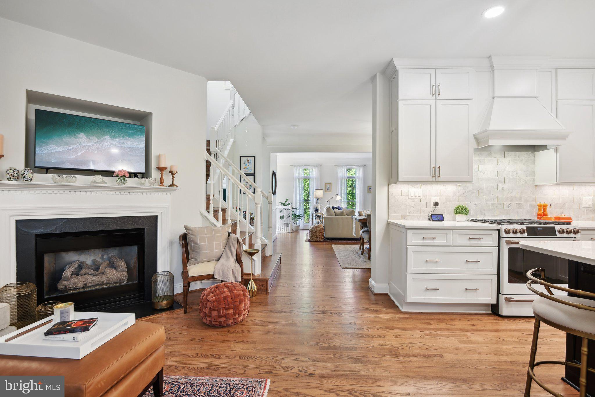 1331 Sundial Drive Reston, VA 20194 - Photo 13 of 38 Open kitchen/family room to living/ dining w f/p!