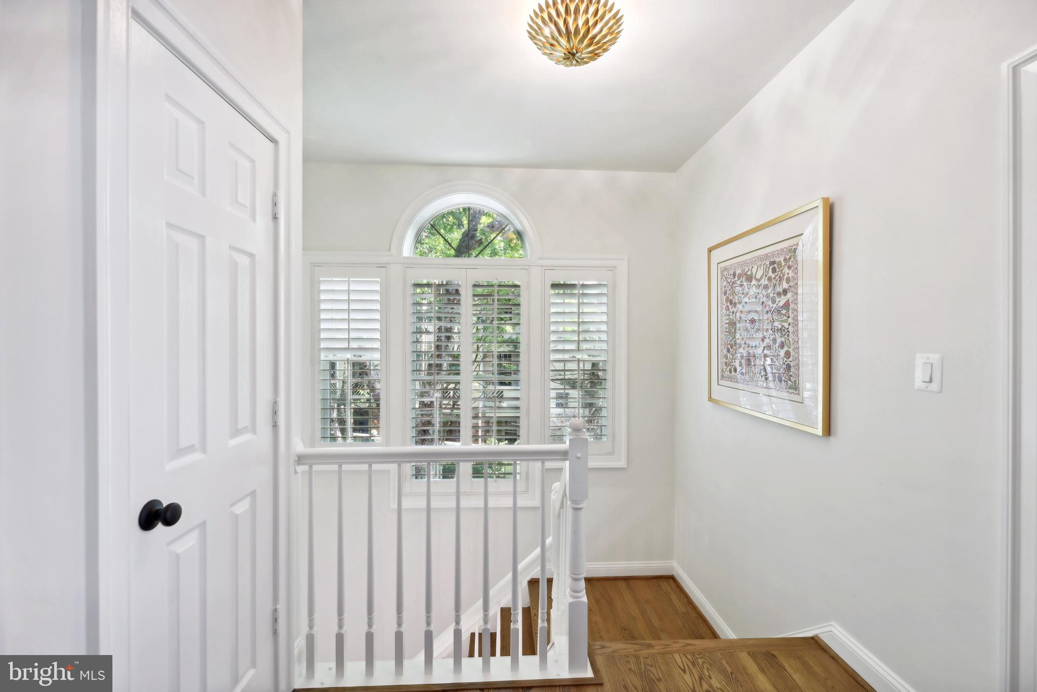 1331 Sundial Drive Reston, VA 20194 - Photo 18 of 38 Palladium window at upper staircase