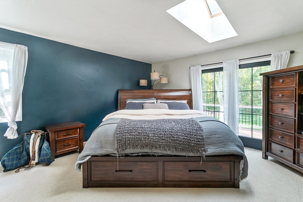124 Wood Hill Road Monson, MA 01057 - Photo 17 of 41 a bedroom with a bed next to a window