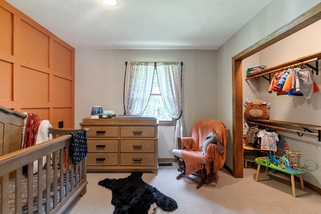 124 Wood Hill Road Monson, MA 01057 - Photo 23 of 41 a bedroom with furniture and a window