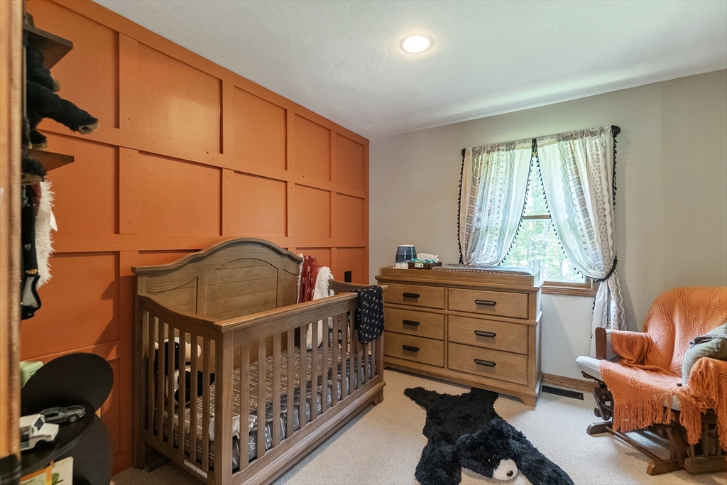 124 Wood Hill Road Monson, MA 01057 - Photo 24 of 41 a bedroom with furniture and a window