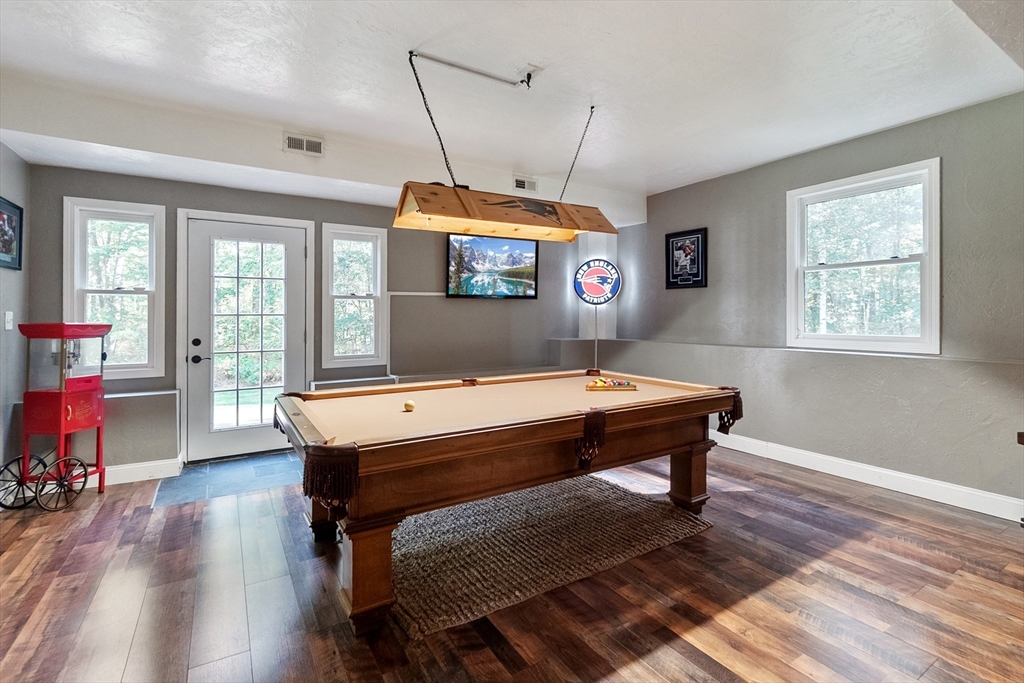 124 Wood Hill Road Monson, MA 01057 - Photo 30 of 41 a room with pool table and wooden floor