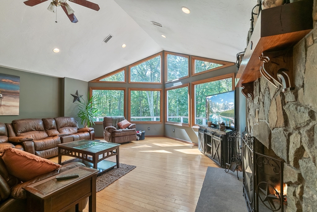 124 Wood Hill Road Monson, MA 01057 - Photo 8 of 41 a living room with furniture and a large window
