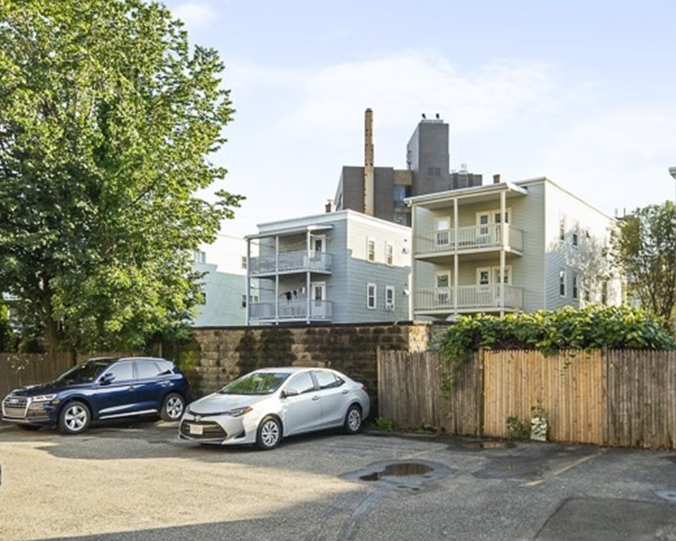 50 Beacon Street, Unit 3 Somerville, MA 02143 - Photo 15 of 15 a car parked in front of a house