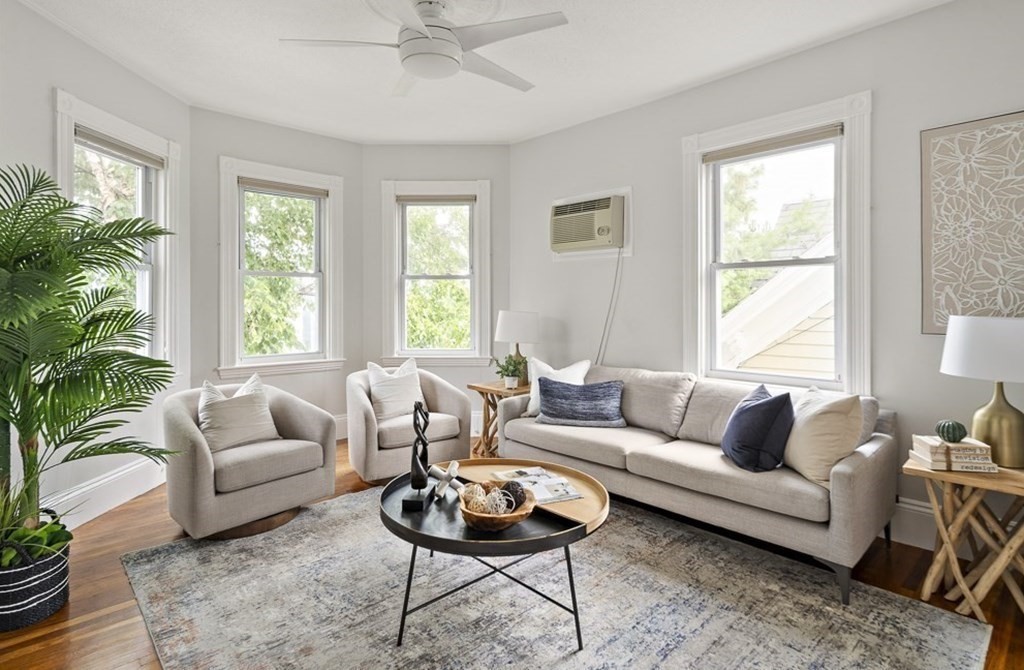 50 Beacon Street, Unit 3 Somerville, MA 02143 - Photo 2 of 15 a living room with furniture and a large window