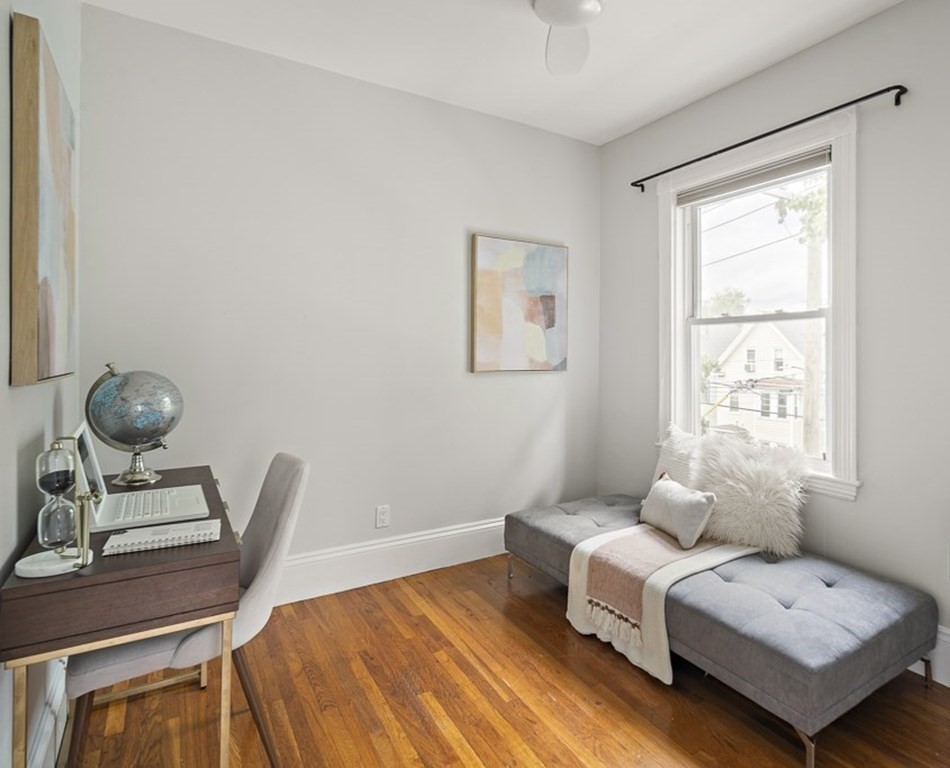 50 Beacon Street, Unit 3 Somerville, MA 02143 - Photo 6 of 15 a bedroom with furniture and a window