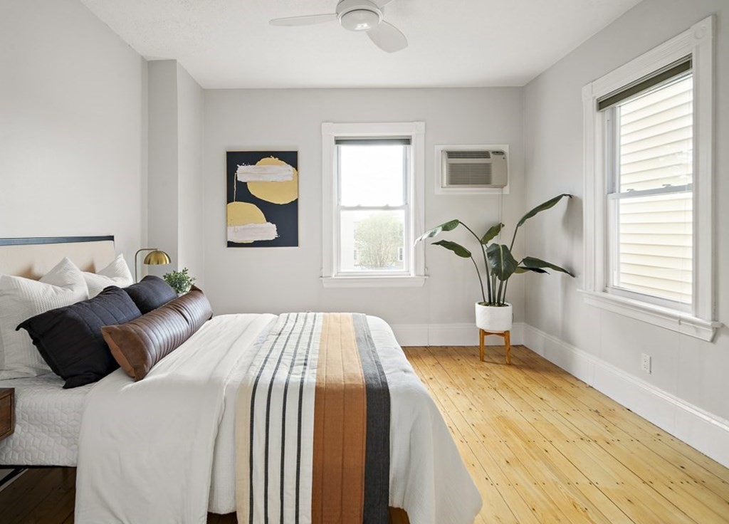 50 Beacon Street, Unit 3 Somerville, MA 02143 - Photo 10 of 15 a bedroom with a bed and window