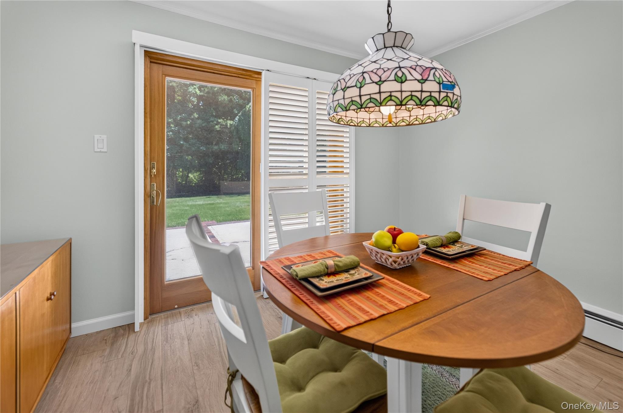 261 Hallock Road Stony Brook, NY 11790 - Photo 3 of 13 a view of a dining room with furniture window and outside view