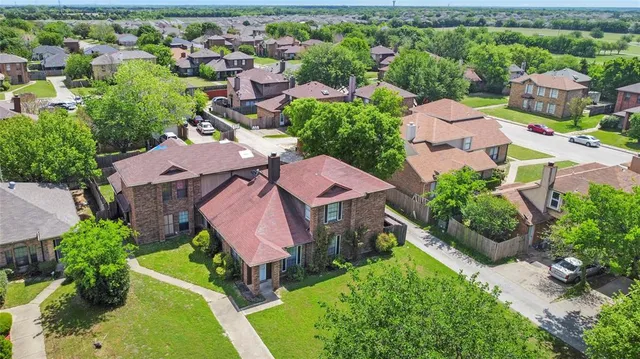 an aerial view of house with yard swimming pool and outdoor seating