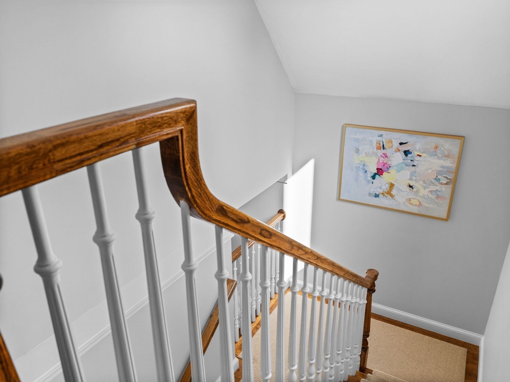4 Farmer Road, Unit 4 Milton, MA 02186 - Photo 15 of 33 a view of staircase with wooden floor and stairs