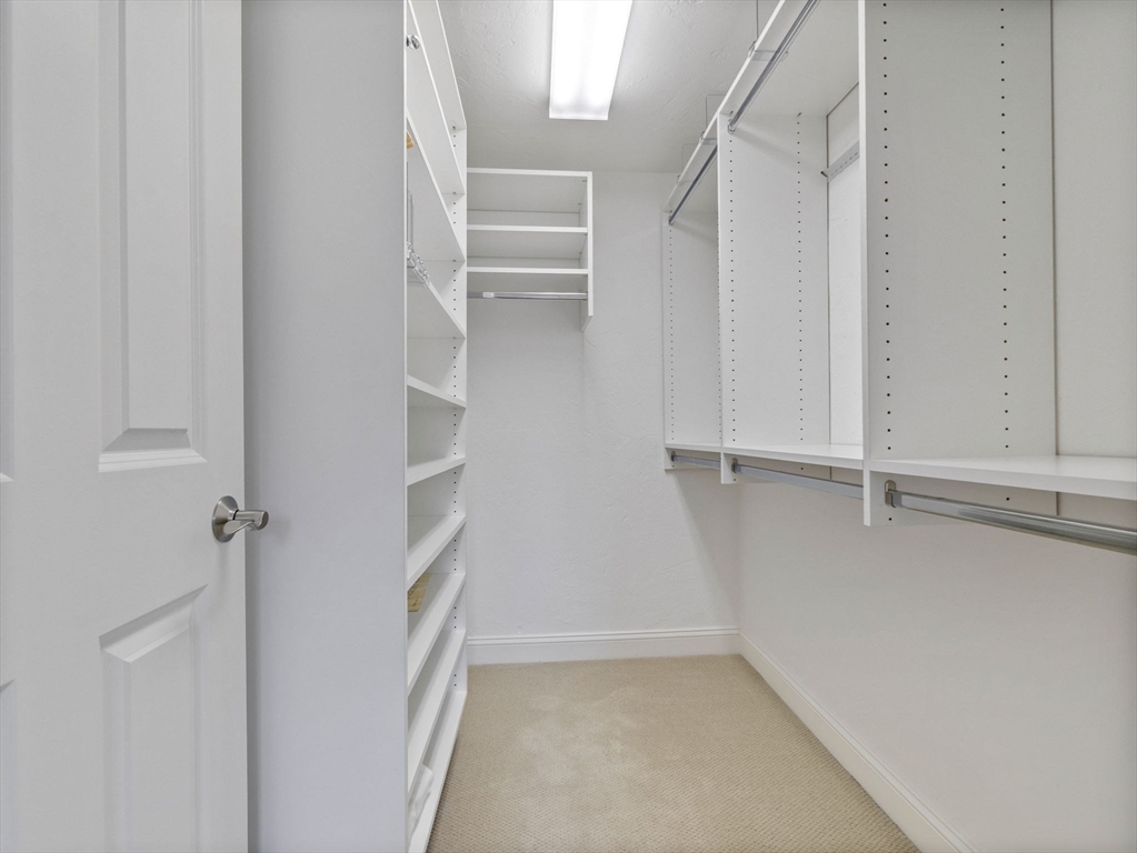 4 Farmer Road, Unit 4 Milton, MA 02186 - Photo 22 of 33 a view of an empty walk in closet