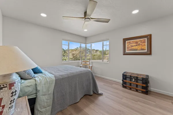 a bed room with a bed and a window