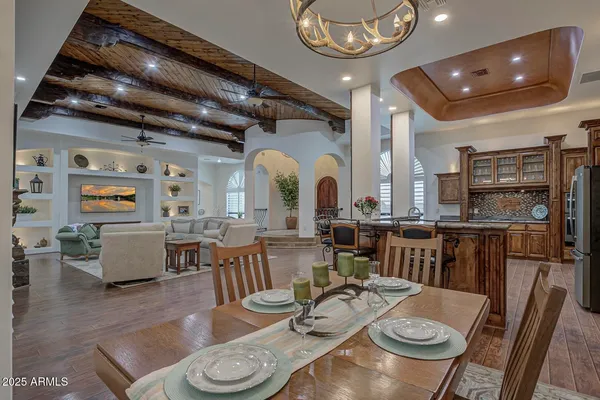 a bedroom with a bed dresser and a window