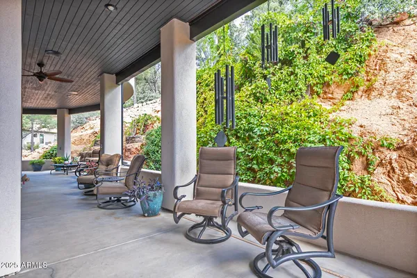 a outdoor living space with furniture and a potted plant