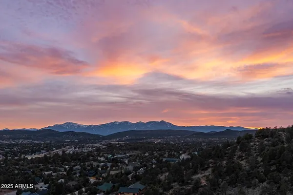 a view of a city with mountain