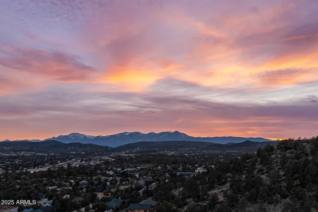 a view of a city with mountain