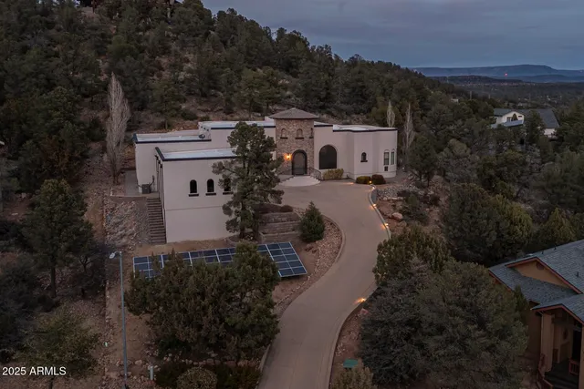 an aerial view of a house with a garden